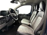 a view of a car ' s interior from the driver ' s seat