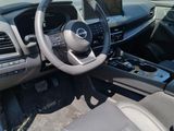 dashboard of a car with a steering wheel and dashboard controls