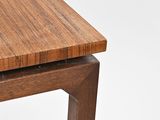 a close up of a wooden table on a white background