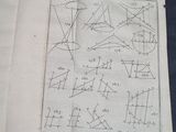 an old book with diagrams of various shapes on it