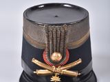 a black hat with a gold star on it