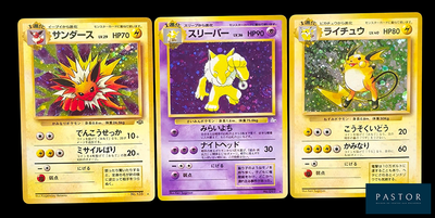 three pokemon cards with different designs on them on a black background
