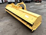 an image of a yellow snow plow in a parking lot