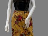 an image of a mannequin dressed in a yellow and black dress