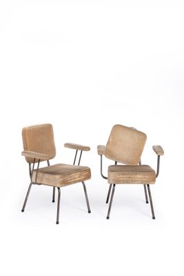 pair of chairs with armrests and armrests in the shape of a chair