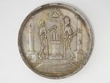 une image représentant une pièce d'argent sur laquelle figurent un homme et une femme