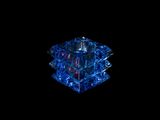 a blue crystal cube that is lit up in the dark