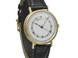 an image of a white and gold wrist watch with roman numerals