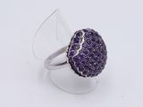 silver ring with purple stones and clear acrylic base
