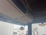 a view of the inside of a vehicle from the driver ' s seat