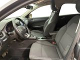 the interior of a car with a dashboard and a steering wheel