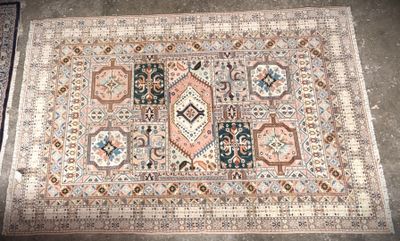 rug on the floor with a lot of different colors and patterns