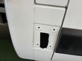 a close up of a door handle on a bus