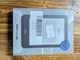 packaging of a tablet computer sitting on top of a wooden table