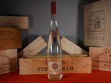 a bottle of wine that is sitting on a table