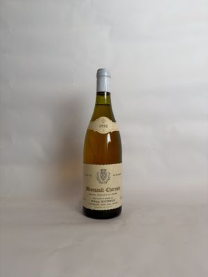 a bottle of wine that is sitting on a table
