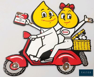 a picture of a couple of people on a scooter