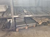 many different types of metal items on the shelves