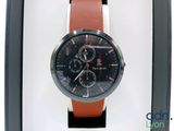 a watch that is in a box on the table