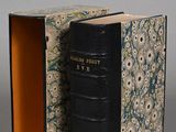 a book that is open to reveal a book cover