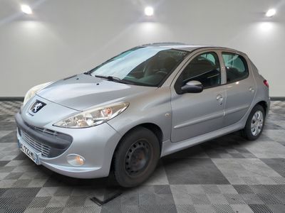 a picture of a silver car parked in a garage