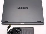 a laptop that has a charger attached to it