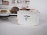 a white box with a picture on it sitting on a table