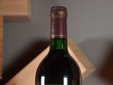 a bottle of wine that is sitting on a table
