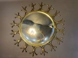 a mirror that is hanging on the wall in the room