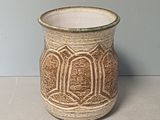 a small vase that is sitting on a table