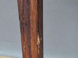 a close up of a piece of wood on a table