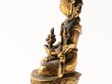 an image of a statue of a person sitting on top of a table