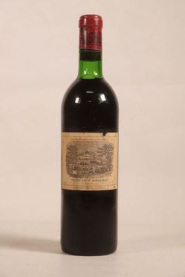a bottle of wine that is sitting on a table