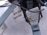 a close up of a helmet with a tag attached to it