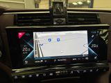 the dashboard of a car with a gps device in the center