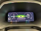 the dashboard of a car with a digital display in the center