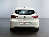 the rear end of a white car in a white room