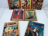 a set of five vintage tintin comic books