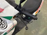 a close up of a motorcycle with a sticker on it