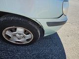 a car that has a flat tire on the street