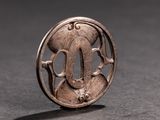 an image of a silver ring with a flower design on it