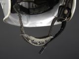 a close up of a helmet with a strap on it