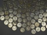 a lot of coins that are on the table
