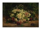 tableau représentant un bouquet de fleurs posé sur une table près d'un mur
