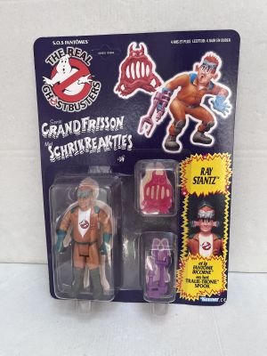the action figure is in a package with a sticker on it
