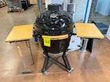 an image of a big black grill in a warehouse