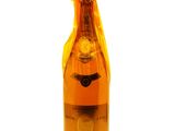 a bottle of wine that is sitting on a table