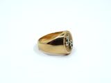 an image of a gold ring with a diamond in the center
