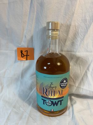 a bottle of liquor that is sitting on a table