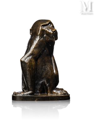 an image of a bronze statue of a monkey on a white background